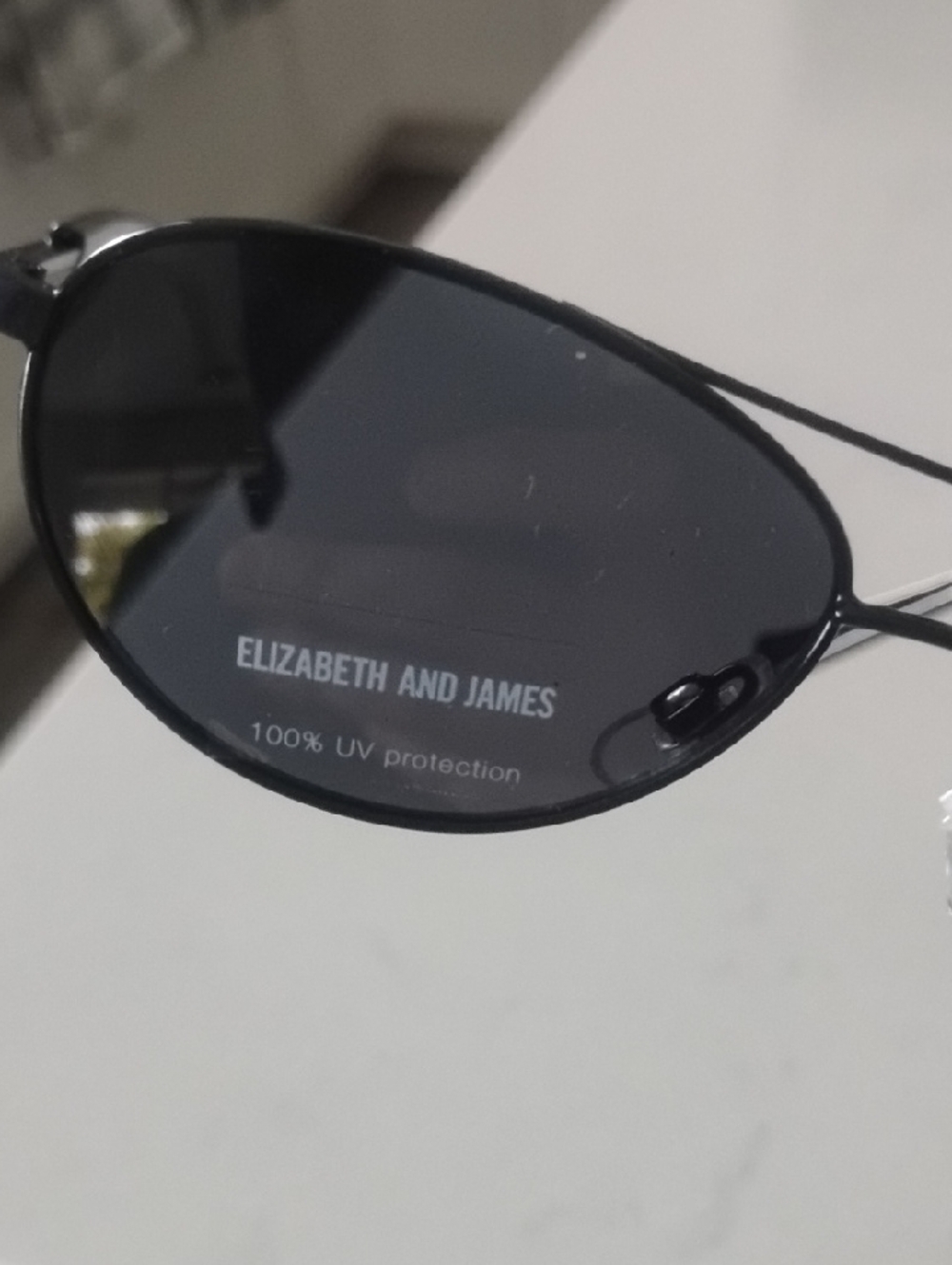 Elizabeth and James Black Slim Oval Sunglasses - Picture 6 of 12